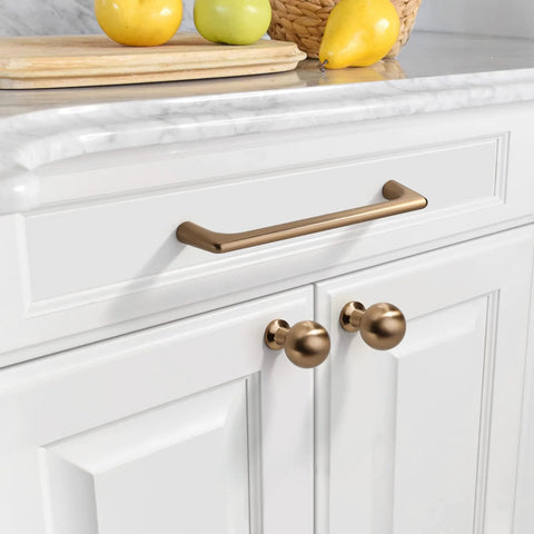 Champagne Bronze Cabinet Pulls 5 Inch 128mm 10 Pack Cupboard Handles For Kitchen Cabinets And Drawers Durable Cabinet Hardware For Modern Home Renovation installed on white cabinet