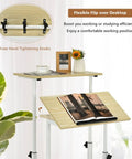 Hassle Free Rolling Height Adjustable Standing Desk With Easy Glide Casters And Extra Roomy Laptop Tray. Desktop with tight knobs.