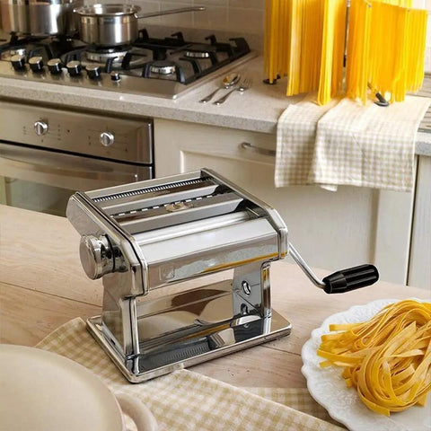 Level Up Your Kitchen Game With This No Sweat Hand Cranked Noodle Maker And Multi Function Dough Roller Press crafted for cutting noodles and rolling dough quickly in a kitchen setting.