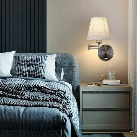 Bedroom with Bedside Wall Mount Light With Dimmable Switch And USB Port Swing Arm Fabric Shade Wall Sconce with plug-in cord on wall.