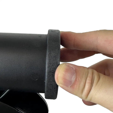 Close-up of hand holding Bike Repair Stand Replacement Plastic Parts YC-100ST-W for YC-100ST and YC-100BH Black Upgrade Kit component.