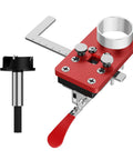 Stainless Steel Hinge Drilling Jig For 35mm Cup Hinges With Ball Bearing Guide For Smooth Pro Grade Cabinet Assembly And On Site Cabinetry Installation Tool, shown close-up with red handle.