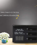 3 Bay Fast Charging Station for Tello Drone Batteries with LED display on wooden surface beside a small plant