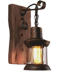 Industrial Farmhouse Wall Sconce with Rustic Wood Base and Glass Lantern Shade, Oil Rubbed Metal Accents, Cozy Warm Glow