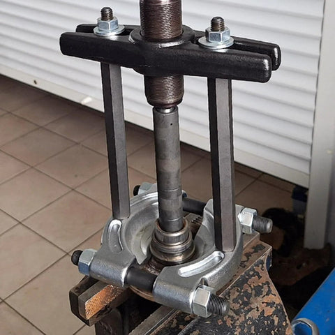 ChgImposs heavy-duty bearing puller for wheel hubs; jaw spread 1/2–5-3/4 in, 5/8-18 threaded holes