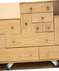 2 Pack Heavy Duty Barn Door Rollers Built Tough For Dead Silent Gliding on a wooden cabinet with sliding drawers.