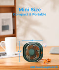 4 Inch USB Desk Fan With 3 Speed Portable Mini Cooling Fan on a desk next to a coffee cup, showing size dimensions.