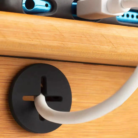 Close-up of 3/4 Inch Cable Grommet Set For Desks And Furniture, Silicone Rubber Black Hole Covers, 8 Pack For Cable Management And Wire Pass Through, 19mm Fit, Keeps Cords Neat And Tidy.
