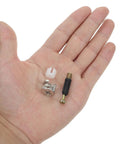 Hand holding components of 24 Piece Furniture Connector Hardware Kit For Cabinet And Wardrobe Assembly, 35mm Plastic Cam Locks With Self Tapping Screws And Eccentric Nuts