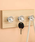 20 Pack Crystal Cabinet Knobs for Cabinets and Drawers, Diamond Shaped Silver Pull Handles on wooden key holder