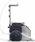 Heavy Duty Digital Liquid Filling Machine With Stainless Steel Housing Straight Up Hella Fast At 13 Liters Per Minute, side view showing tubing and control panel.