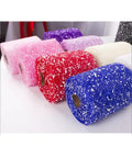 Flower Wrapping Mesh Paper Roll 20 Yards 6 Inch Wide Snow Dot Pattern for Bouquets in various colors on display