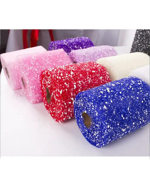 Flower Wrapping Mesh Paper Roll 20 Yards 6 Inch Wide Snow Dot Pattern for Bouquets in various colors on display