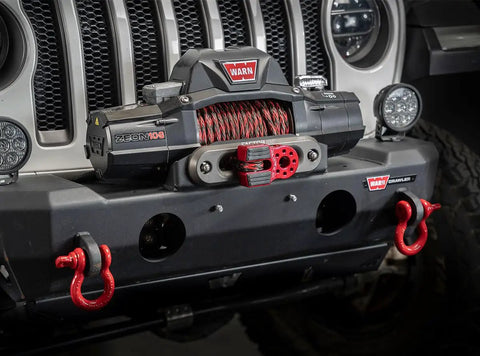 Front view of 4x4 featuring FlatLink Folding Winch Shackle Bracket, Low-Profile Mount For 4x4 Off Roadin, 16,000 Lb Max Load, gray color