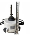 Close-up of Air Conditioning Brushless DC External Motor WZDK100-38G ZKSP-100-8-1-1 with ruler for scale, top view