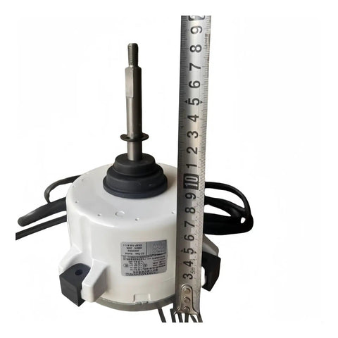 Close-up of Air Conditioning Brushless DC External Motor WZDK100-38G ZKSP-100-8-1-1 with ruler for scale, top view