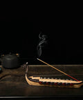 Hand Carved Dragon Boat Incense Holder For Stick Incense Burners on dark surface