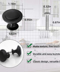 Diagram showing dimensions of Set Of 12 Black Round Cabinet Knobs 1.18 Inch With Screws Matte Finish Stainless Steel Knobs On Zinc Alloy Bases.