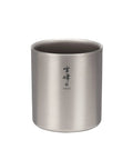 Dope Titanium Double Wall Insulated Coffee Mug With 15 Oz Capacity Stacks Easy For Ultralight Camping Trips And Backpackin Adventures Keeps Your Sips Smokin Hot Or Ice Cold All Day. Silver titanium coffee mug with a smooth finish and compact design.