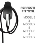 Slick Wall Mount Charging Cable Organizer For Tesla With Beefy Chassis Bracket And Tight Grip Power Cord Holder For Model 3 Model Y Model S Model X Garage Setup Matte Black, showcasing tight grip design with charging cord.