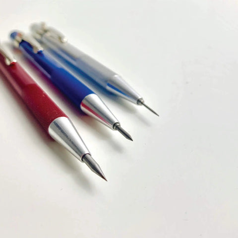 Slick Retractable Awl And Air Release Needle No Fuss Carbon Steel Scribe For Vinyl Weeding Cricut Crafting with three colored handles.