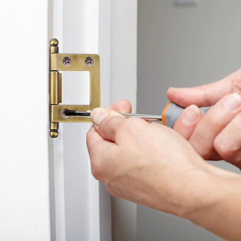 Vintage Style Solid Metal Cabinet Door Hinges 19mm Non Mortise Folding Hinges being installed on wooden door