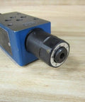 Hydraulic Check Restriction Z2FS 6-5-44/2QV Single Unit R900476838, blue pilot-operated valve on wooden surface