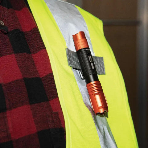 Rechargeable Pocket Flashlight With Dual-Direction Clip, 275 Lumen High Power, clipped to vest for hands-free use
