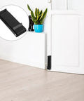 Kickdown Door Stop Stainless Steel No Punchin Install Heavy Duty Door Wedge on door, shown with close-up inset.