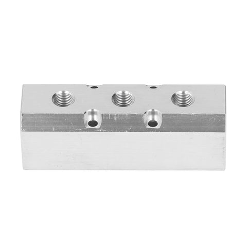Front view of a heavy duty high flow aluminum pneumatic block with 40x40mm footprint G1/2 inlet and G1/4 outlet for factory automation