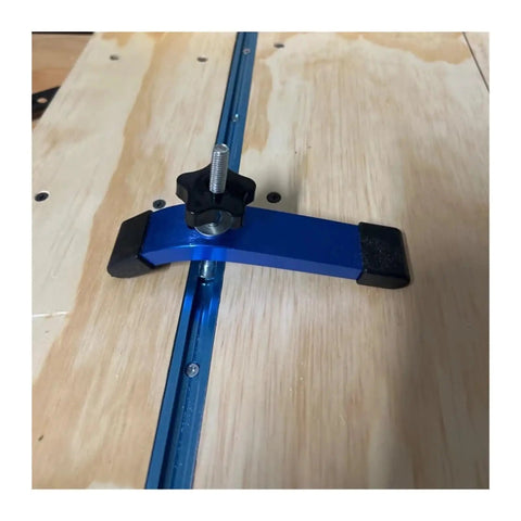 Close-up of a single blue clamp from the Four Pack T Track Hold Down Clamps Kit for Workbench and CNC Tables, mounted on wood.