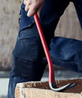 Heavy Duty Wrecking Bar 15 Inch Steel Nail Puller For Demolition, red finished ends visible in use on wooden surface