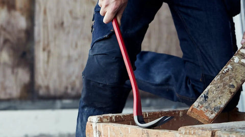 Heavy Duty Wrecking Bar 15 Inch Steel Nail Puller For Demolition, red finished ends visible in use on wooden surface