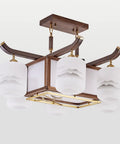 Straight Up Smooth Rectangular Wooden Pendant Light With Black Walnut Finish Hangin Easy In Any Living Space Or Cafe Delivering Top Tier Ambient Vibes And Energy Smart 90W Ceiling Lamp For Bars And Dining Rooms with four frosted glass shades.