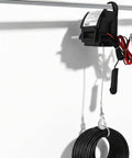 Heavy Duty 12V Electric Winch With 5000 Lift Capacity And 300W Copper Motor showing motor unit, hook, and cable.