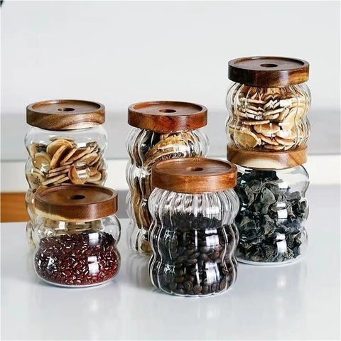 Premium Textured Glass Tea Canisters For Loose Leaf Coffee Beans And Pantry Essentials in various sizes with wooden lids.