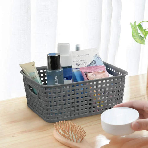 Pack Of Six Gray Plastic Storage Baskets, Durable Stackable Organizer Bins, 10.03 In By 7.59 In By 4.09 In, filled with toiletries