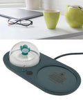Smart Electric Cup Warmer Base With Three Adjustable Heat Modes To Keep Your Favorite Drinks Piping Hot While You Knock Out Tasks At Home Or In The Office on a desk.