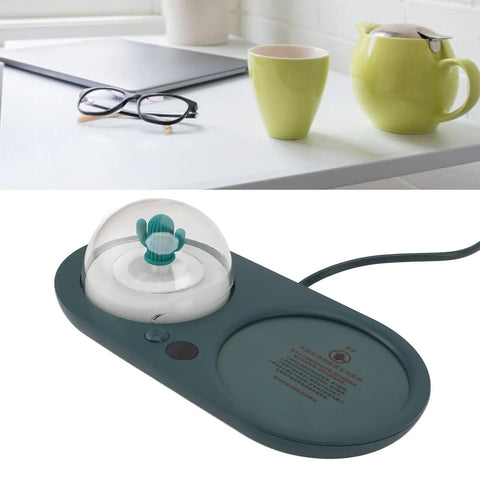 Smart Electric Cup Warmer Base With Three Adjustable Heat Modes To Keep Your Favorite Drinks Piping Hot While You Knock Out Tasks At Home Or In The Office on a desk.
