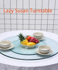 Heavy Duty 40 Inch Tempered Glass Lazy Susan Turntable With Quiet Aluminum Rollers For Butter Smooth 360 Spins and Zero Hassle Serving At Your Next Backyard Bash with fruits and bowls