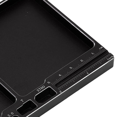 Close-up of Magnetic RC Parts Tray Portable Aluminum Alloy Repair Tray With Magnetic Screw Holder Plate, showing metric ruler