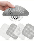3 Pack 5.5 Inch Silicone Drain Covers With Strong Suction Bases Flat Square Hair Catchers For Showers And Kitchen Sinks Reusable Gray Strainers displayed with suction grip.