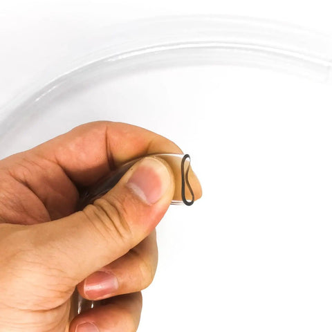 Close-up of flexible Leak Proof Clear PVC Oil Drain Tube for Lawn Mowers and Tractors, product number OEM 532148456 148456.