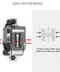 Front view of gray dual-piston hydraulic disc brake caliper for MTB use