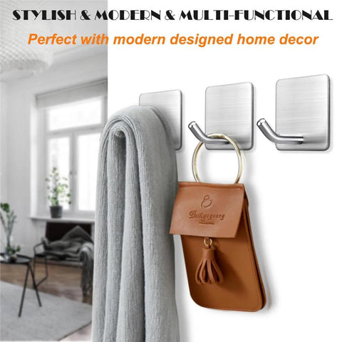 Heavy Duty Adhesive Towel Hooks 4 Pack Stainless Steel Self Adhesive Wall Hangers holding towel and bag in modern room