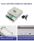 Pro Grade Industrial Counting Scale With 10 Kg Capacity And 0.1 Gram Precision, Fast Readouts, High Sensitivity Sensor, Tare And Counting Functions, Multi Unit Switchable For Lab Or Inventory Use, showing top view with plug and battery power options