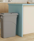 Slim Jim Confidential Doc Trash Can With Locking Lid, 16 Gallon, Gray, beside kitchen counter