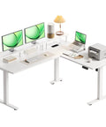Electric L-Shaped Standing Desk With Monitor Stand And Built In Power Outlets 59 Inch Height Adjustable Sit Stand Desk For Home Office A Real Workhorse Lift Table For Workstation White with dual monitors and printer setup.