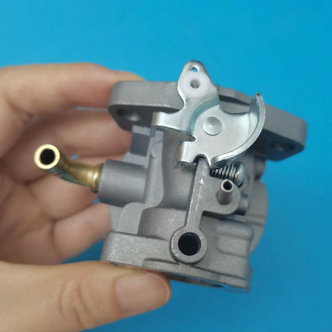 Hand holding Replacement Carburetor For 205cc Wood Chipper Shredder CS 4265 24A-414B766 Direct Fit Easy Install Rugged