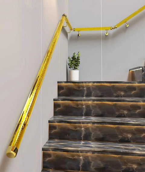 Clear Acrylic Stair Handrail With Dang Sturdy Gold Wall Brackets For Interior Or Exterior Steps on dark marble staircase.